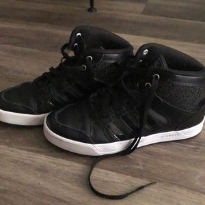 Adidas black cheetah high tops